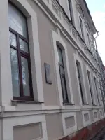 Мемориальная доска на здании аэроклуба, улица Красной Армии